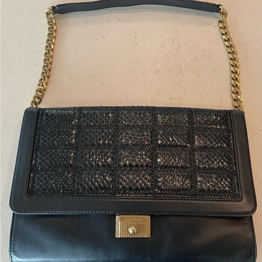 Jimmy Choo leather purse with detachable chain strap.